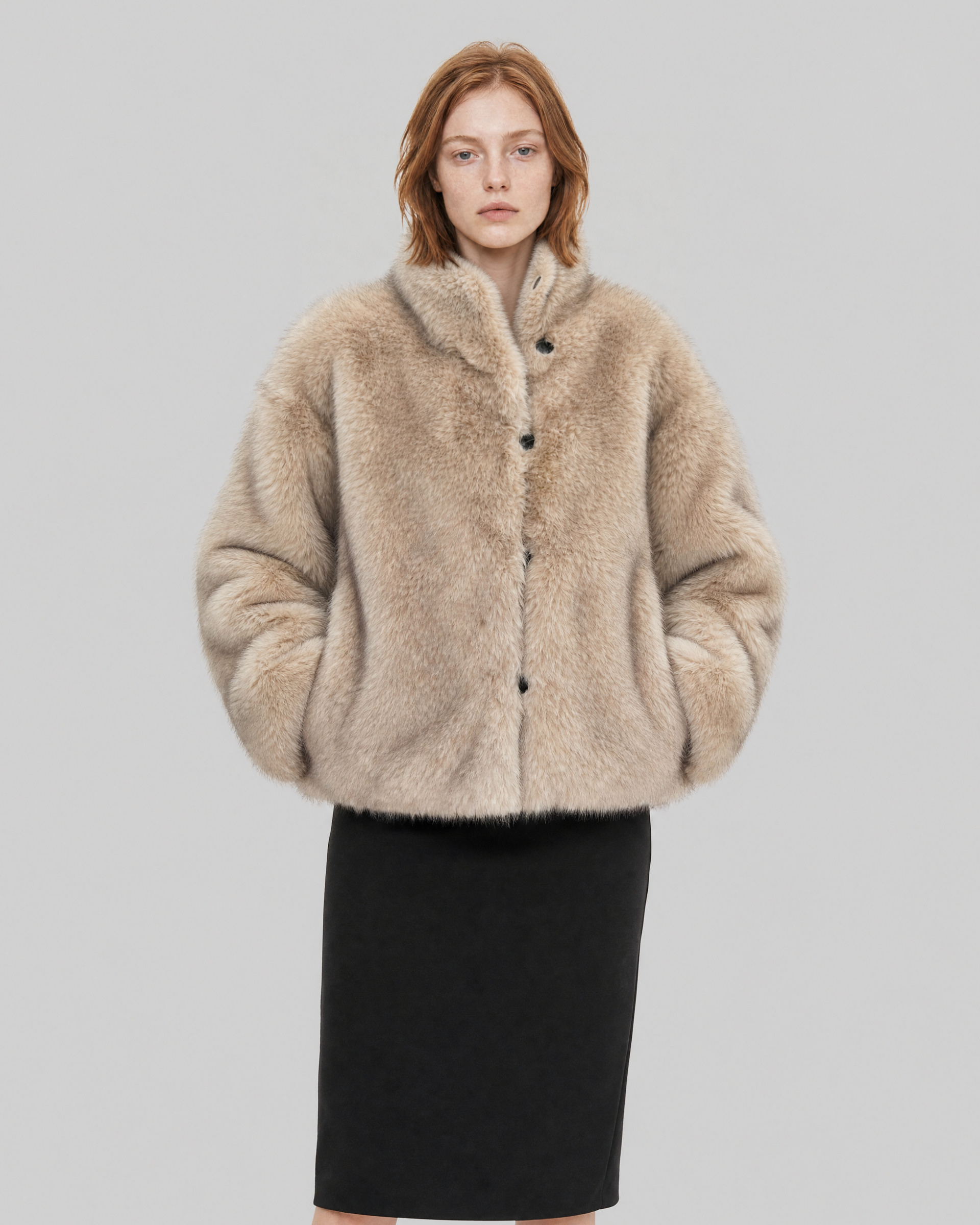 Reversible beige and black faux fur coat