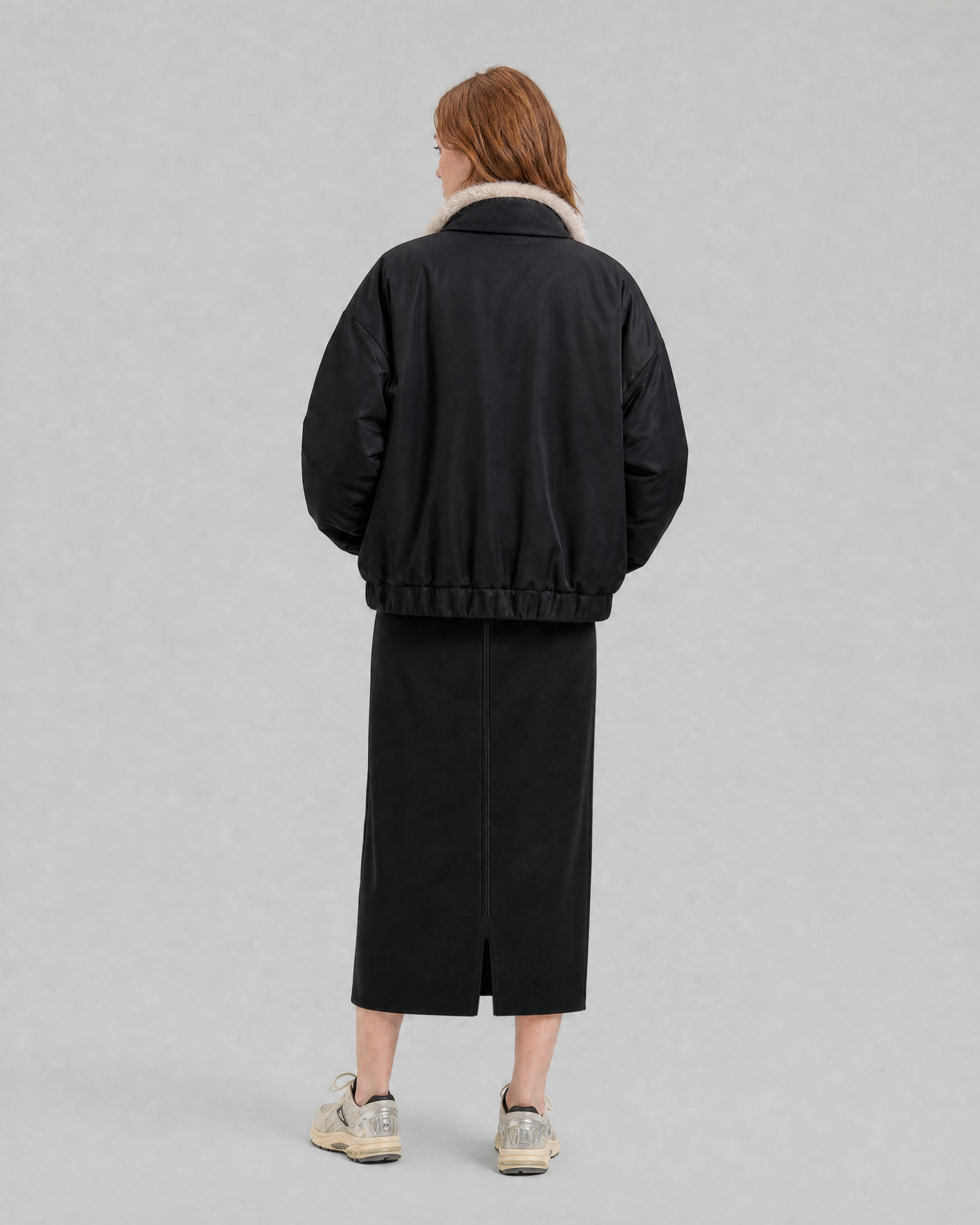Reversible beige and black faux fur coat