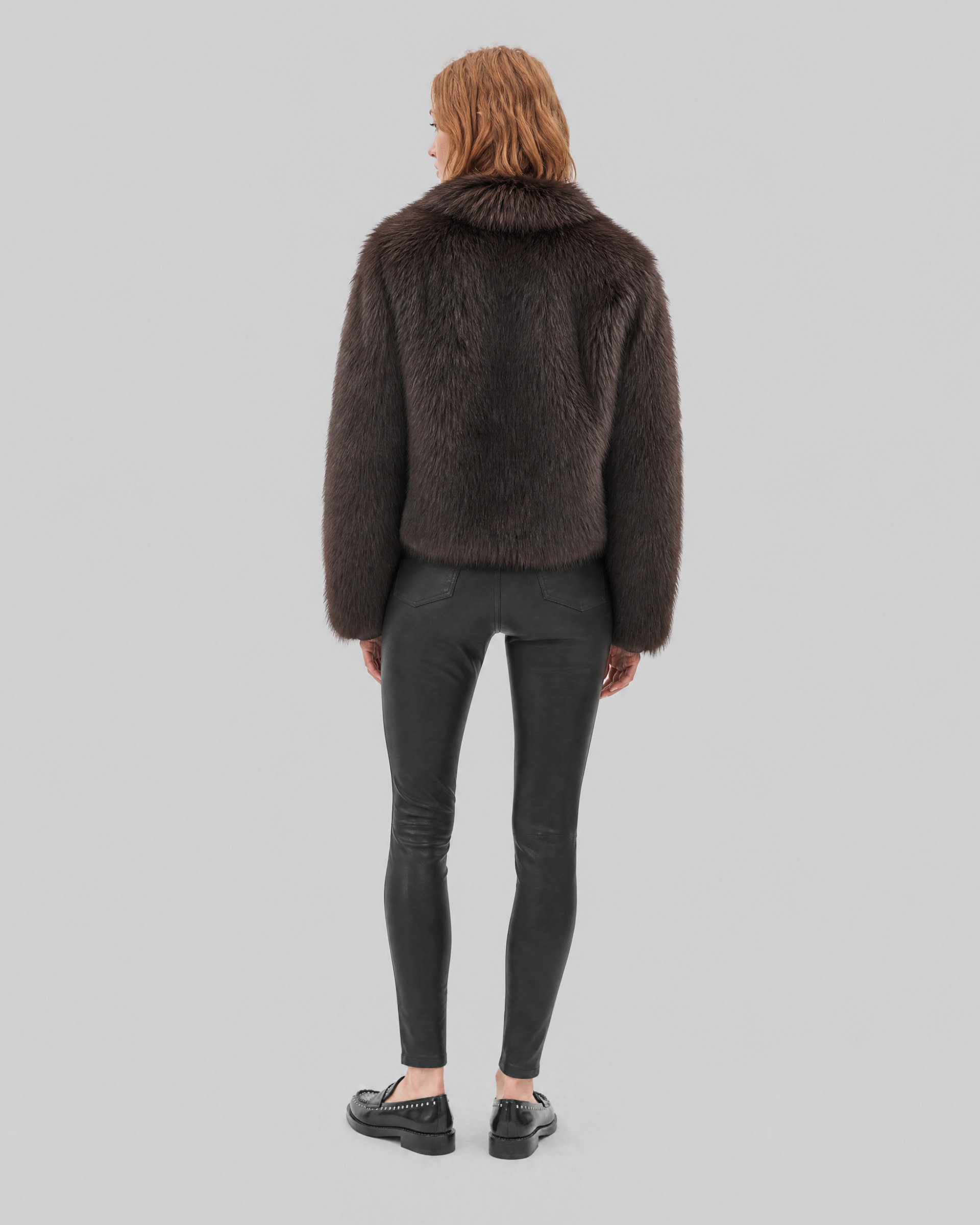 Brown faux fur coat with a zipper