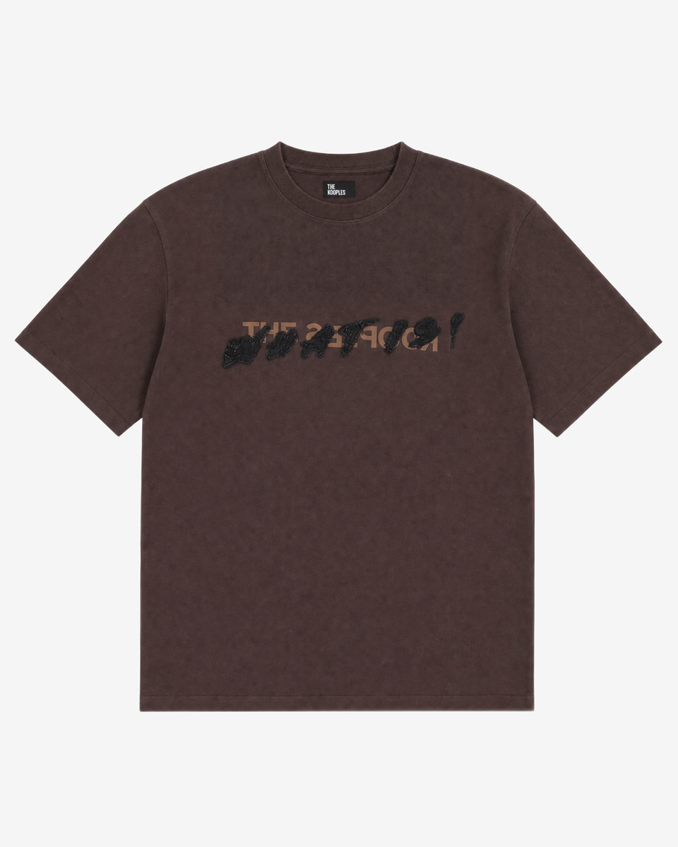 What is brown denim patch t-shirt