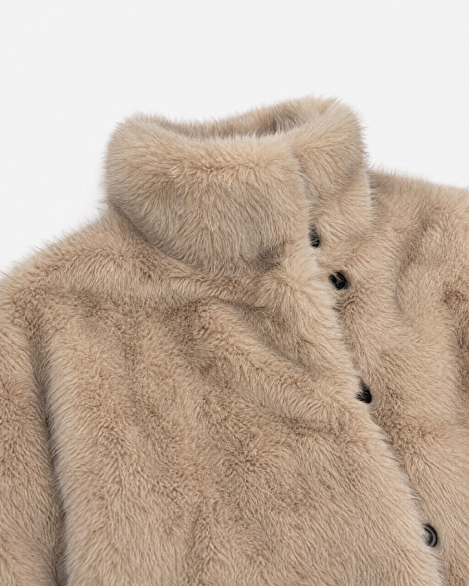 Reversible beige and black faux fur coat