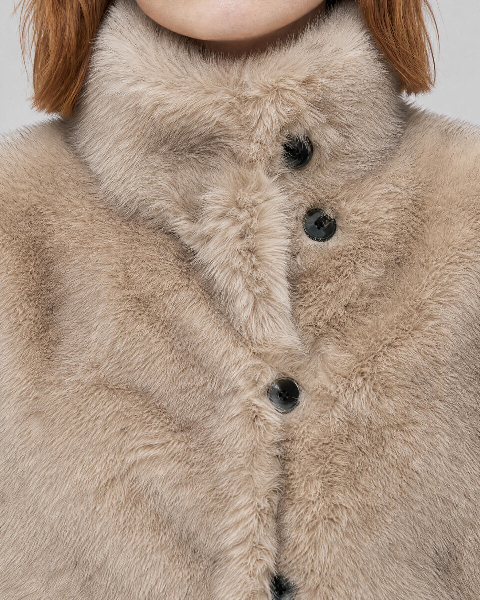 Reversible beige and black faux fur coat