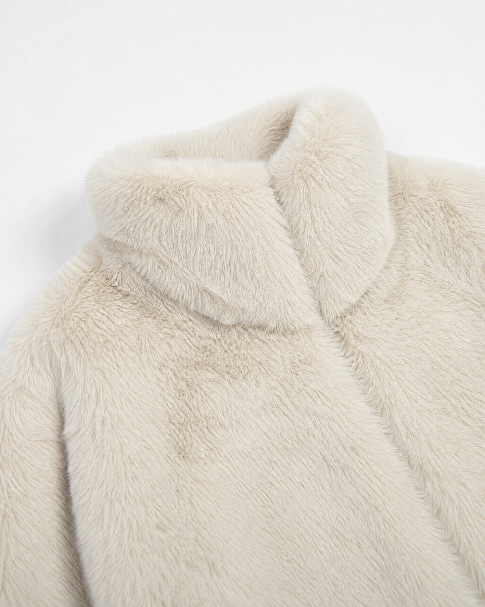 Ecru faux fur coat with a high collar