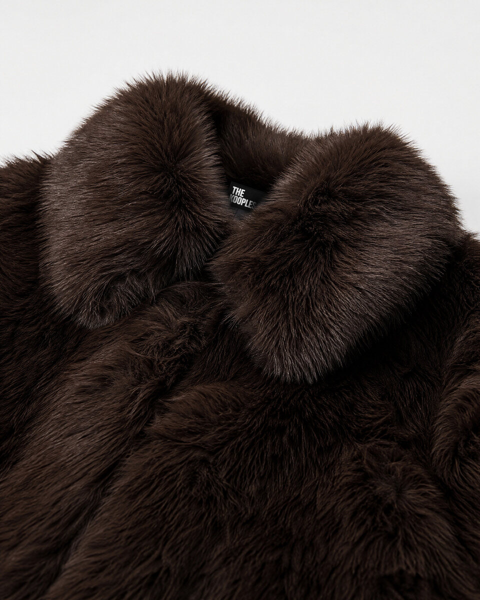 Brown faux fur coat with a zipper
