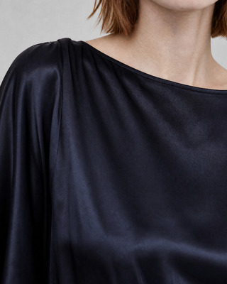 Long satin dress with a navy gold chain