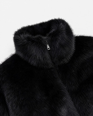 Black faux fur coat with a high collar