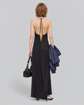 Long black satin dress with a crossover back