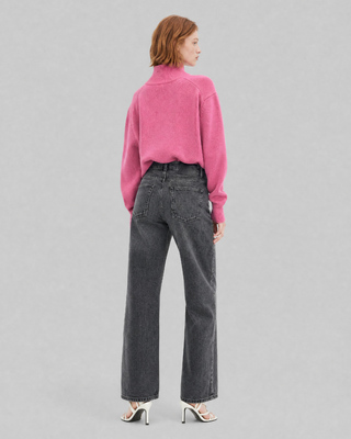 Black straight-leg jeans with a faded wash