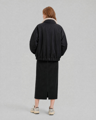Reversible beige and black faux fur coat