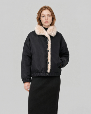 Reversible beige and black faux fur coat