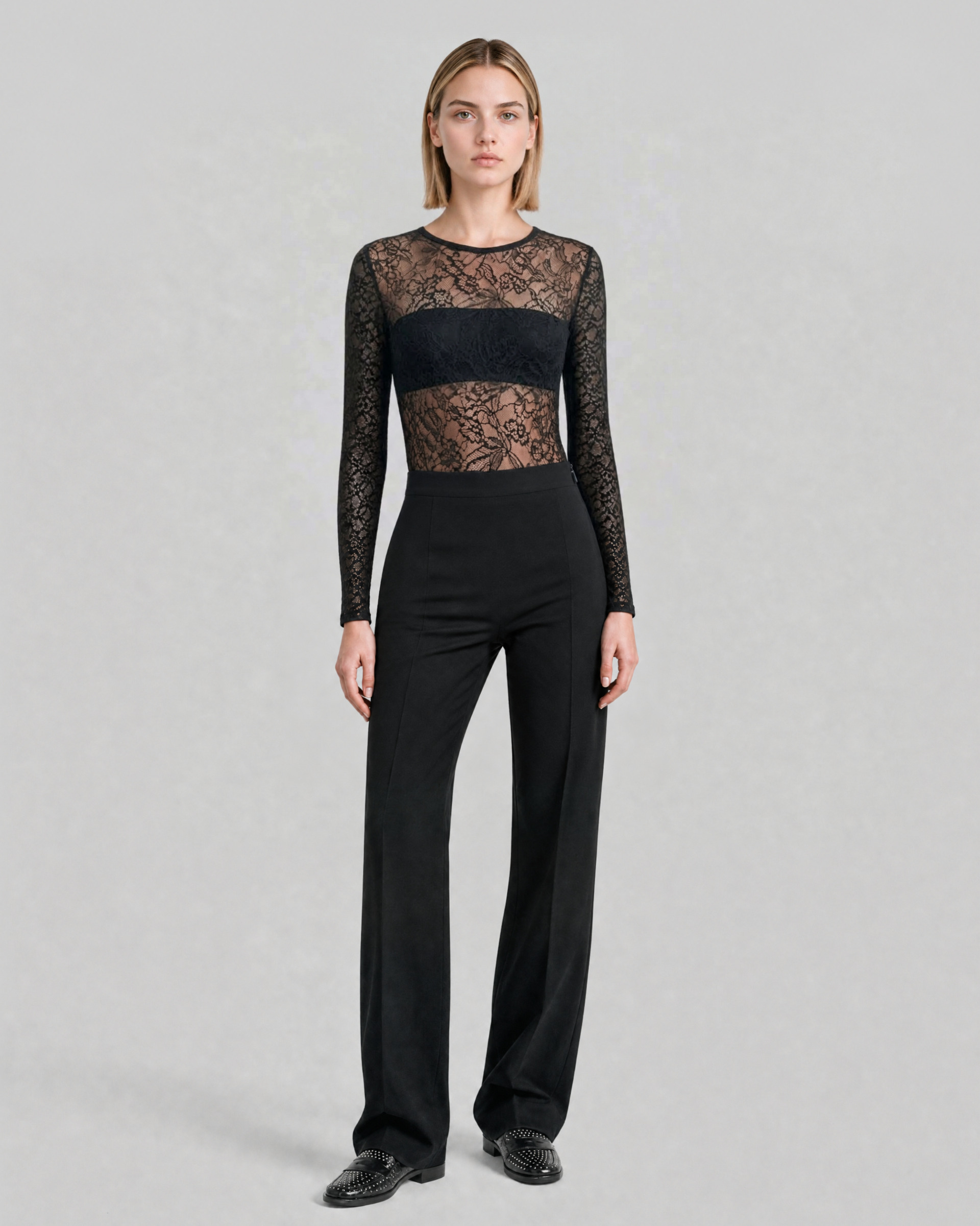 Black, fitted tailored pants made of a wool blend