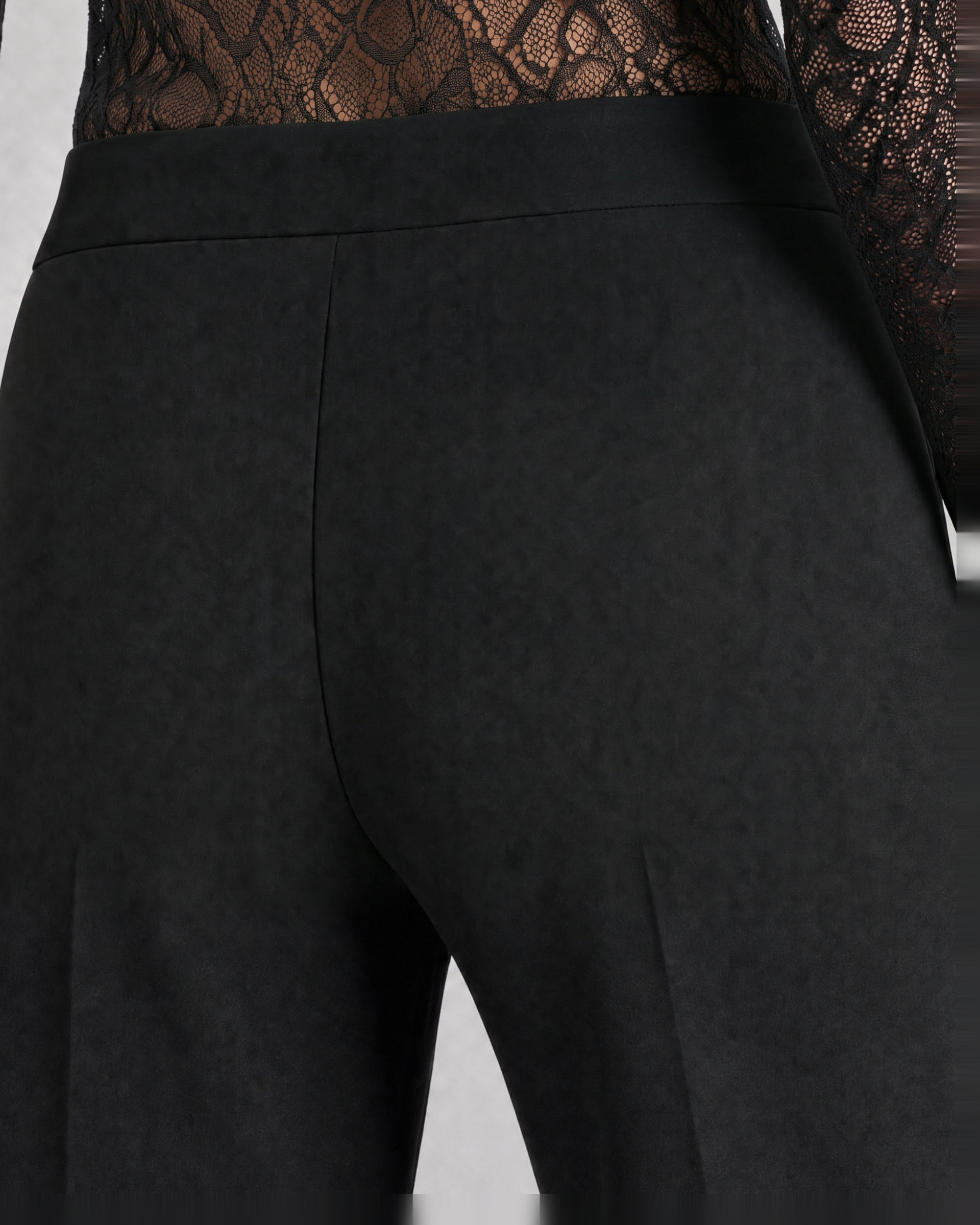 Black, fitted tailored pants made of a wool blend