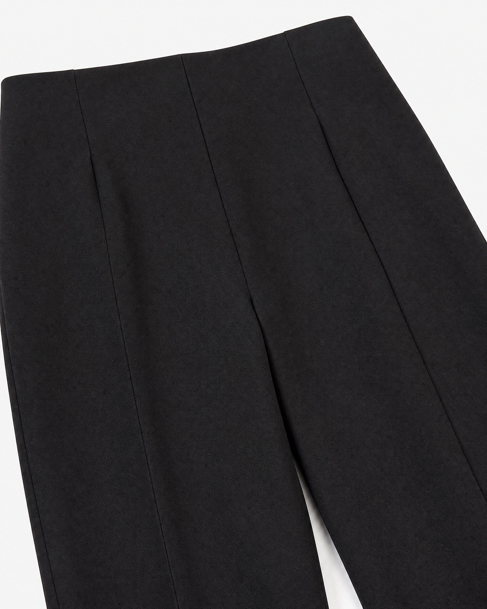 Black, fitted tailored pants made of a wool blend