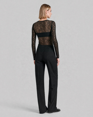 Black, fitted tailored pants made of a wool blend
