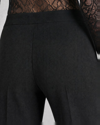 Black, fitted tailored pants made of a wool blend