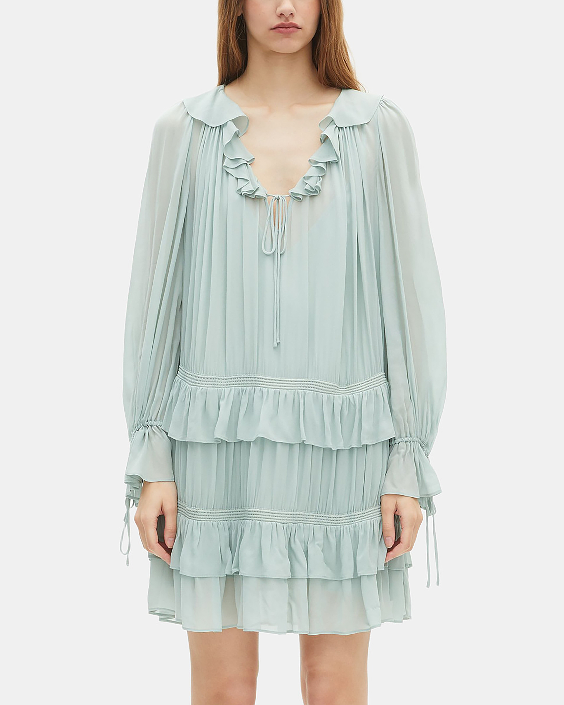 Short dress with blue ruffles