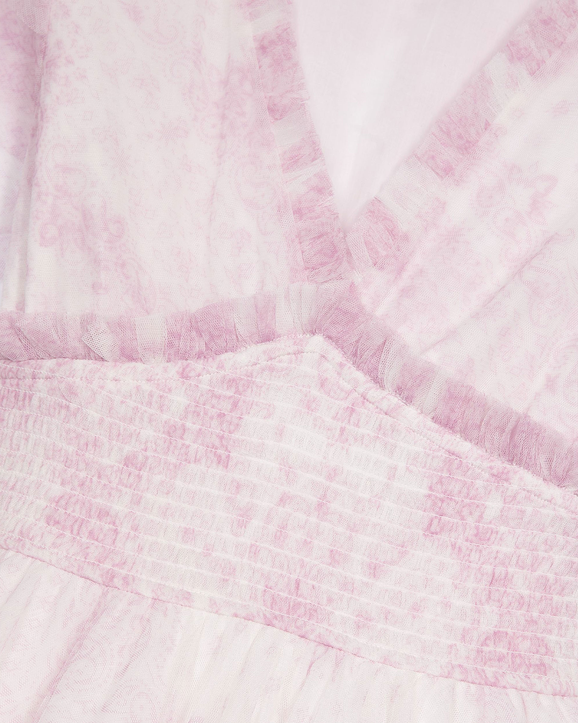 Short dress in pale pink printed tulle