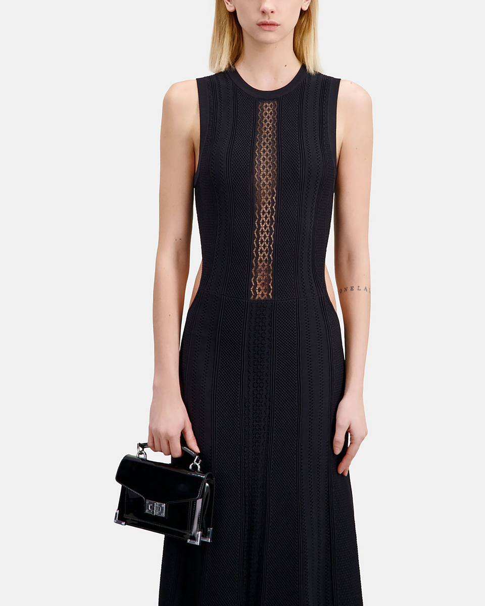 Long black openwork knit dress with openings