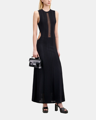 Long black openwork knit dress with openings