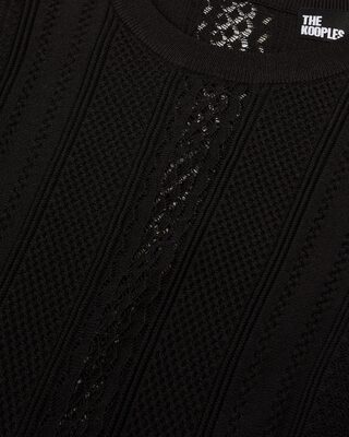 Long black openwork knit dress with openings