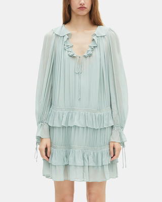 Short dress with blue ruffles
