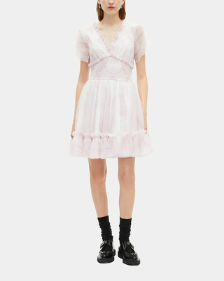 Short dress in pale pink printed tulle
