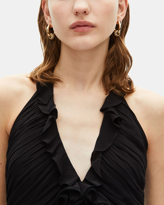Long low-cut dress with black flower detail
