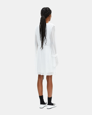 Short ecru dress with ruffles