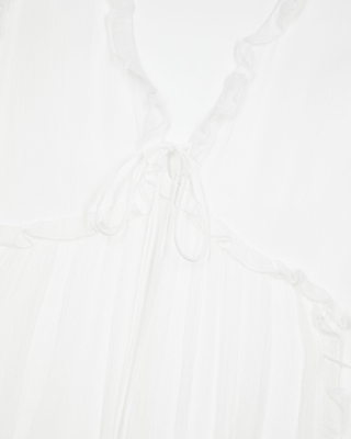 Short ecru dress with ruffles