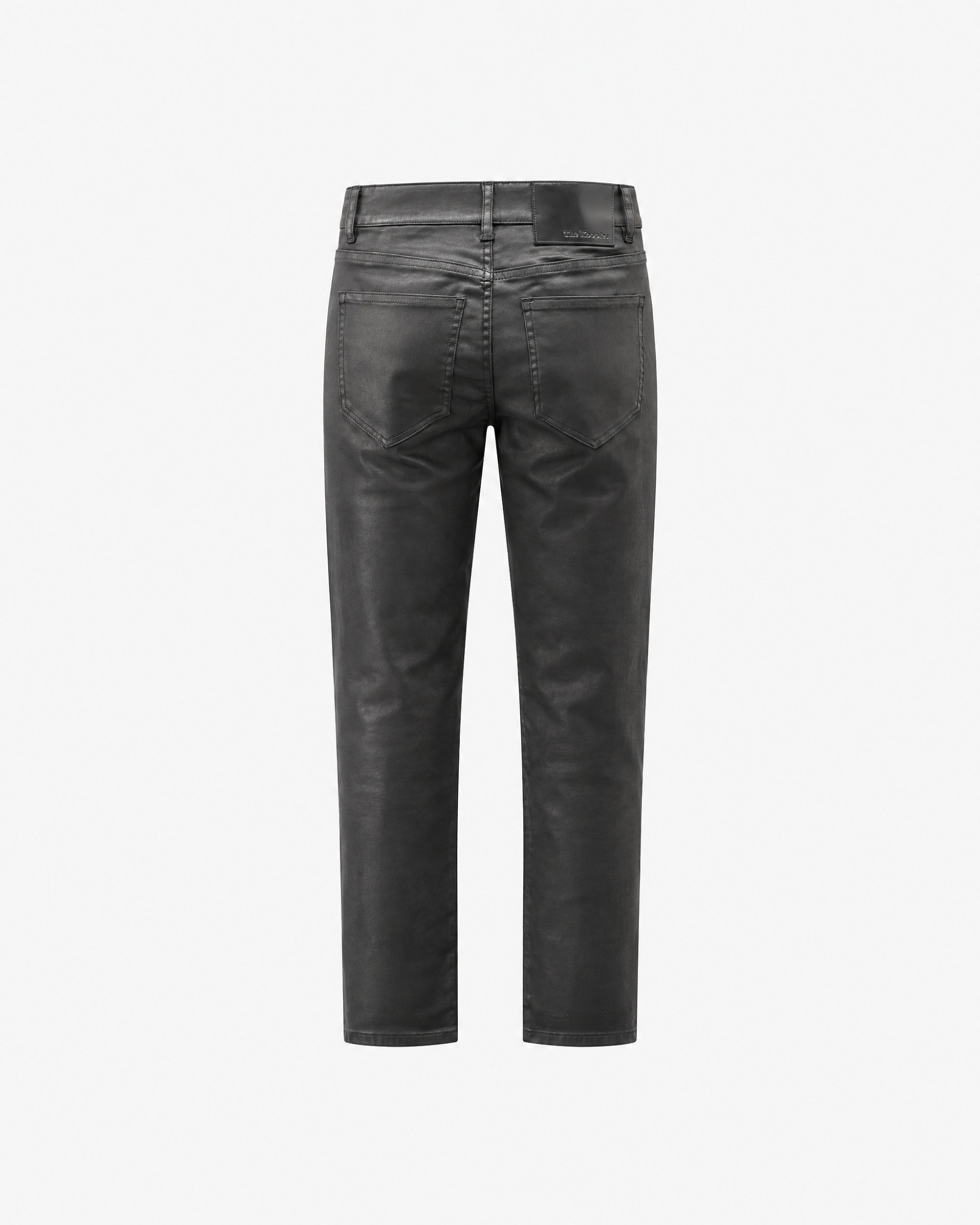 Black slim-fit jeans with a coated finish