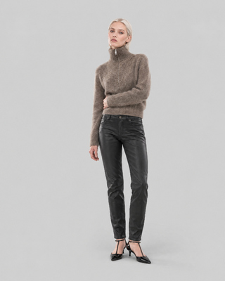 Black slim-fit jeans with a coated finish