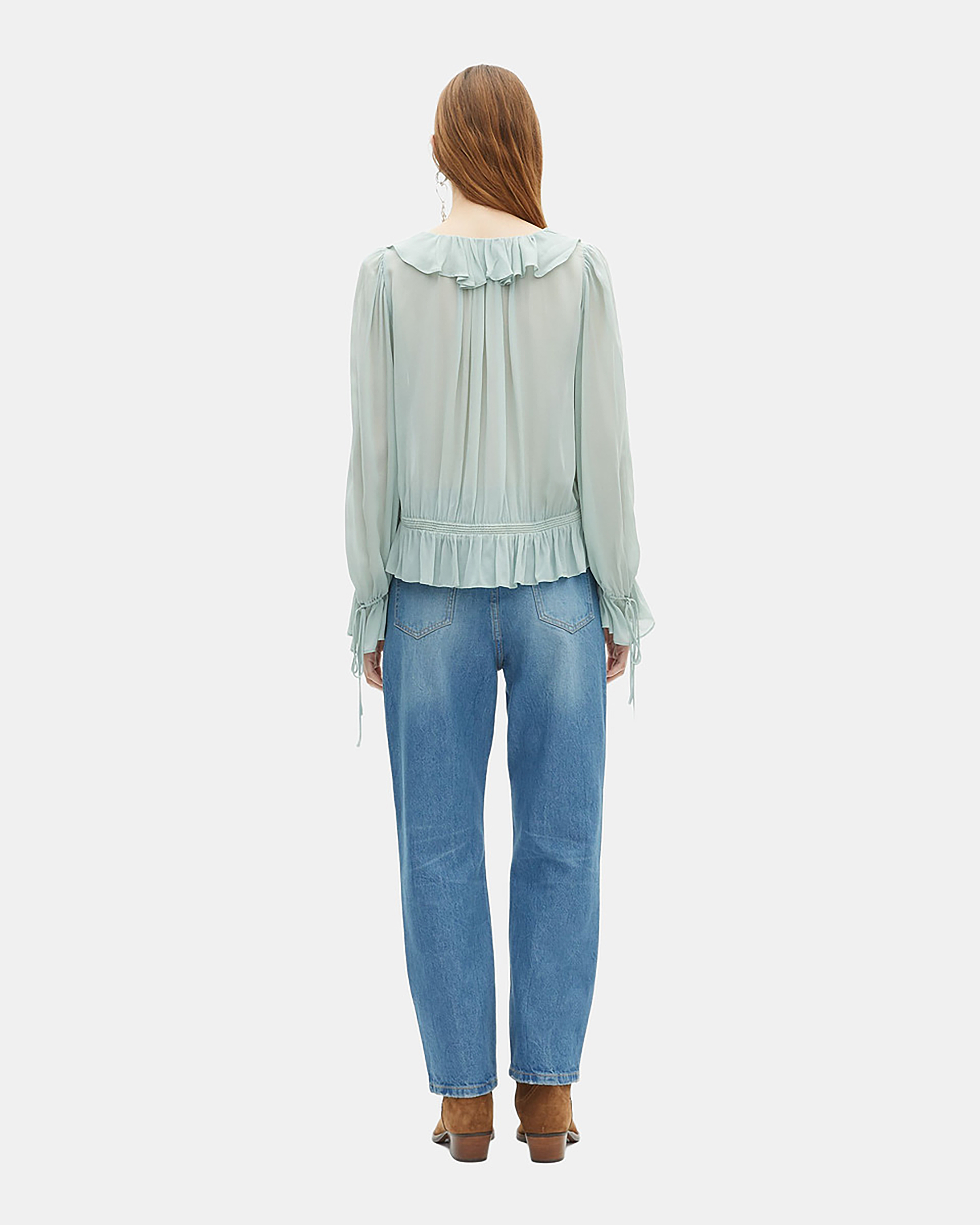 Blue blouse with ruffles