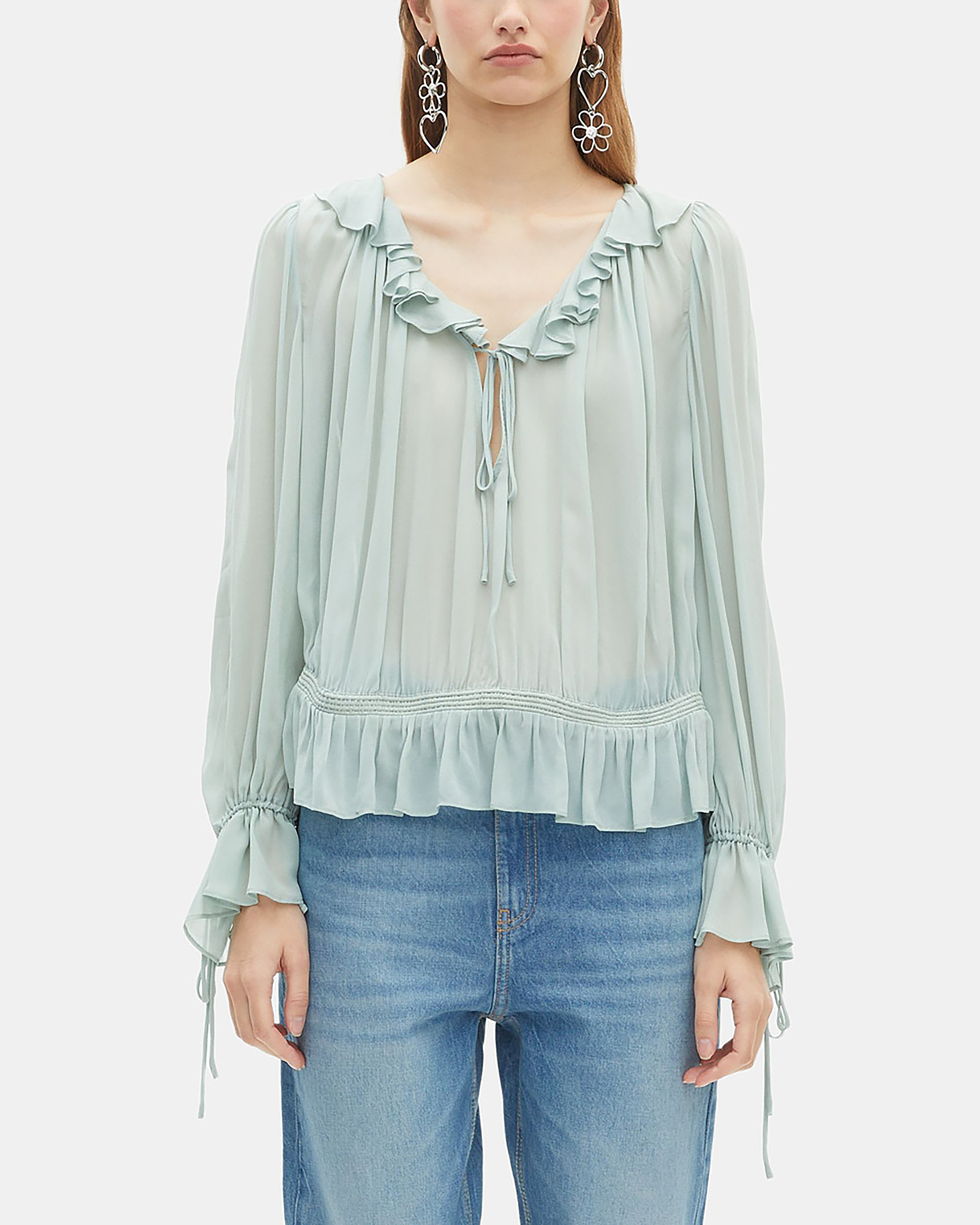 Blue blouse with ruffles