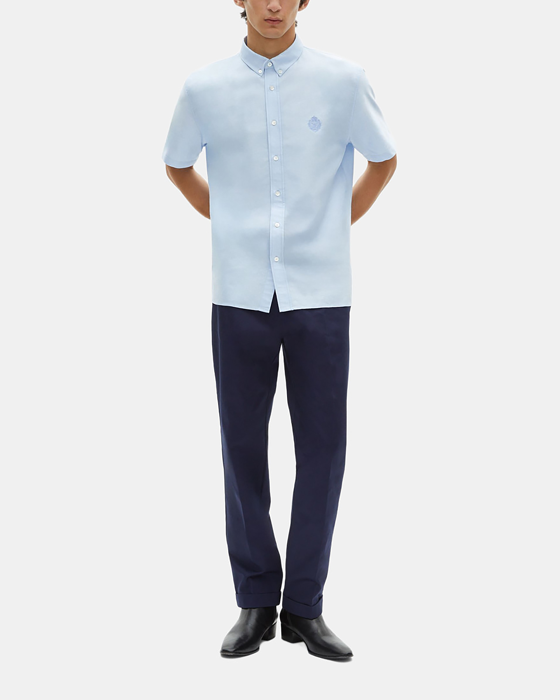 Short-sleeved shirt with blue crest