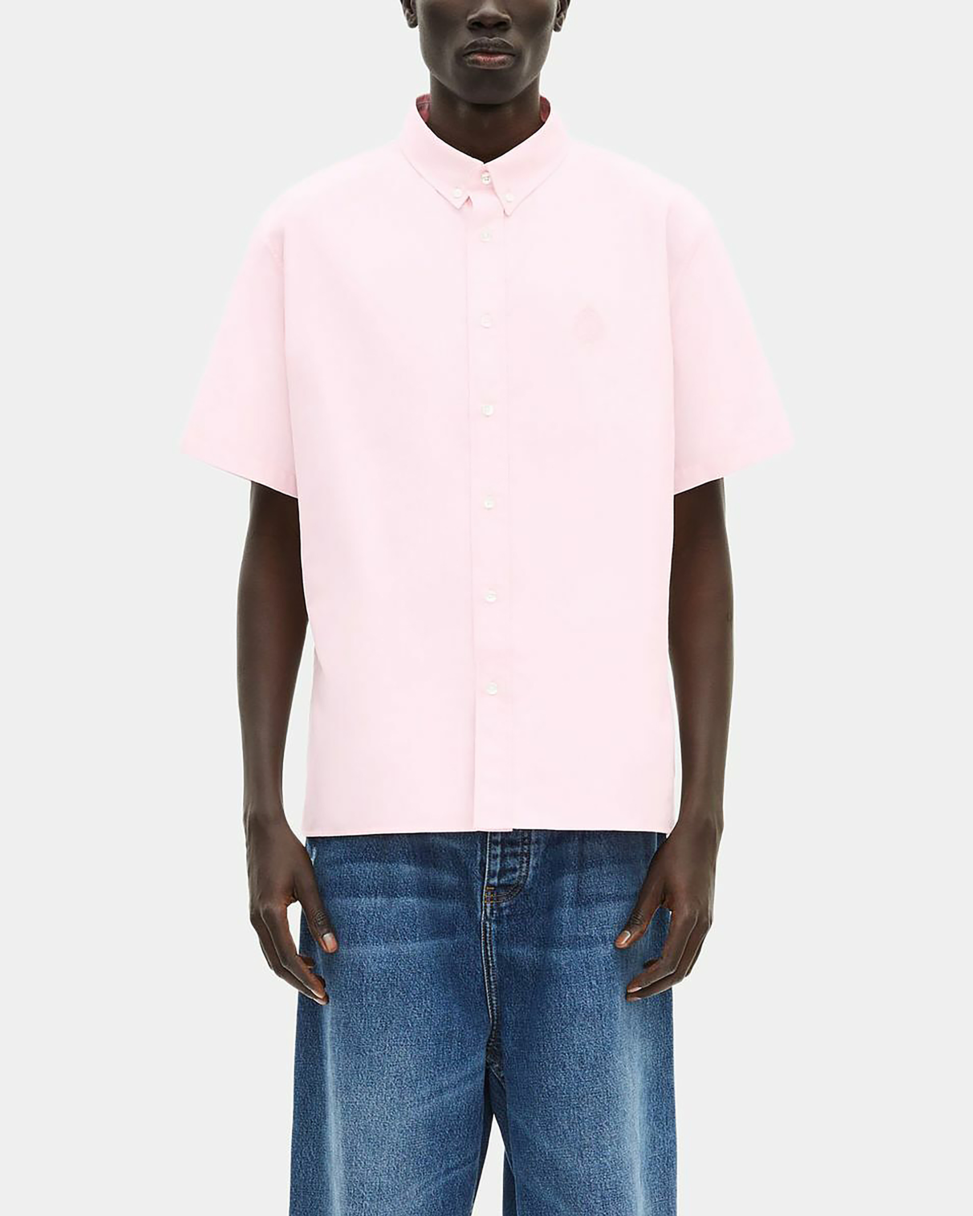 Short-sleeved shirt with pink crest