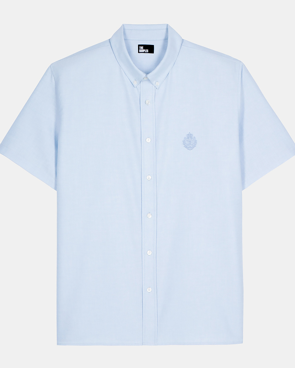 Short-sleeved shirt with blue crest