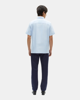 Short-sleeved shirt with blue crest