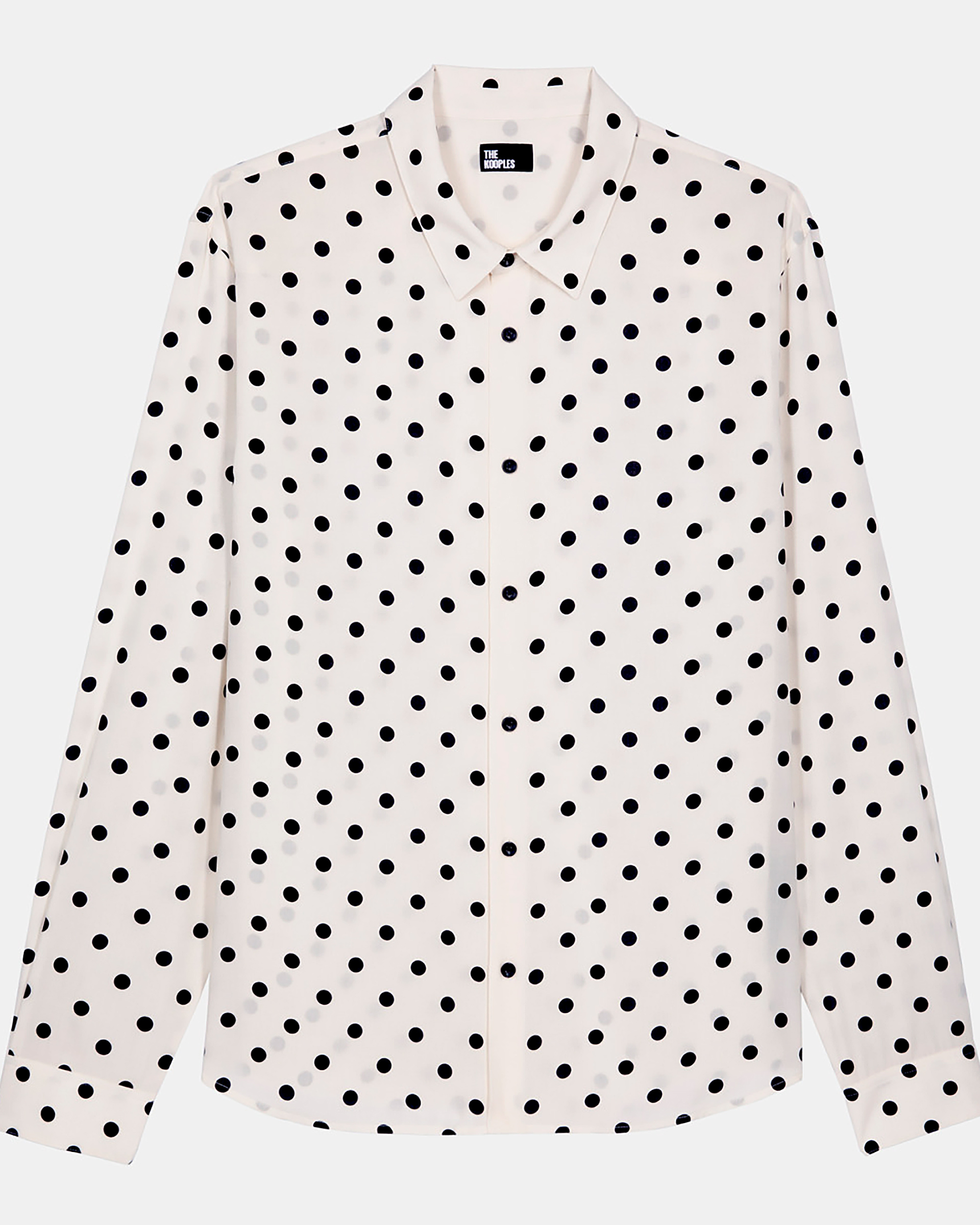 White polka dot printed shirt