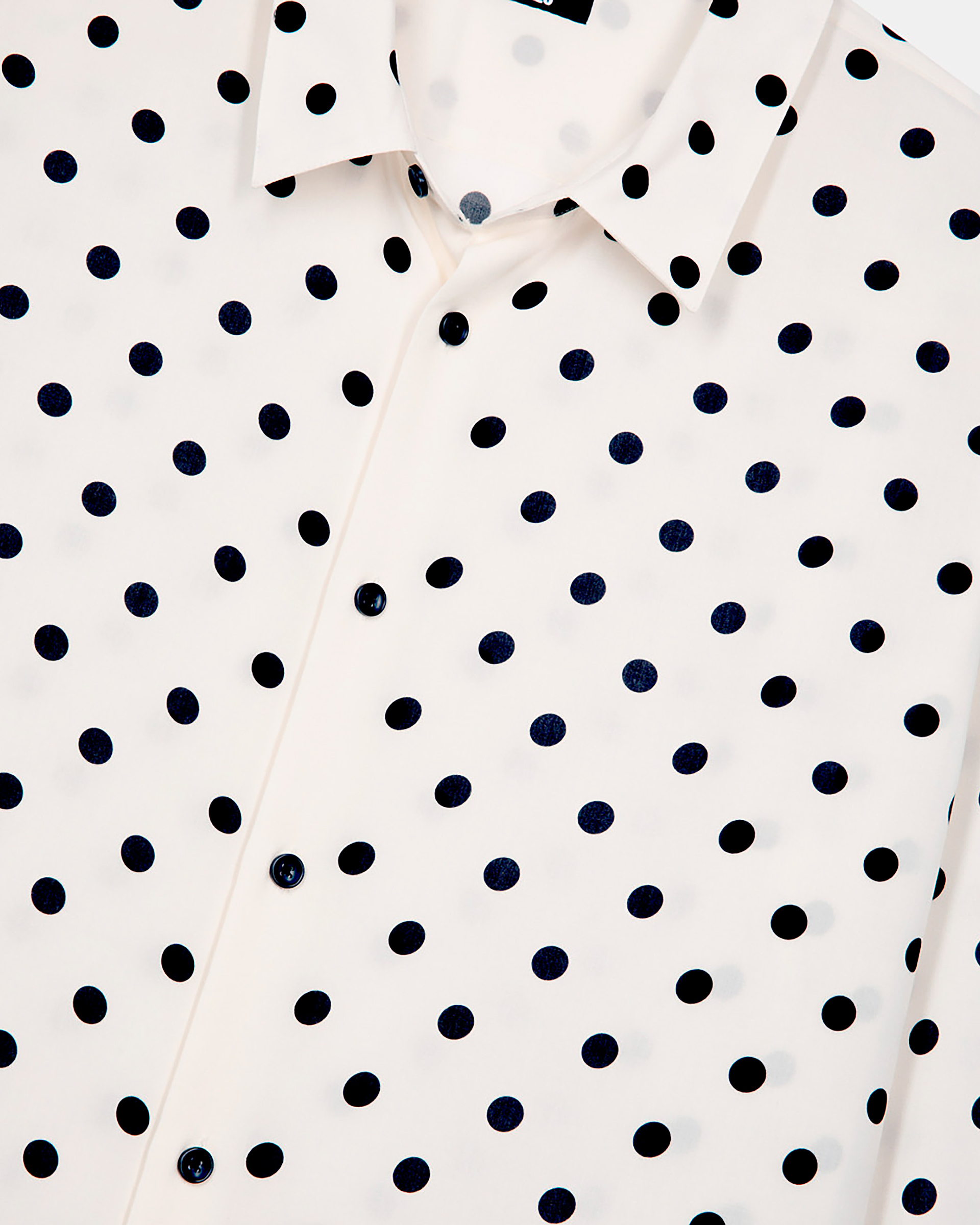 White polka dot printed shirt