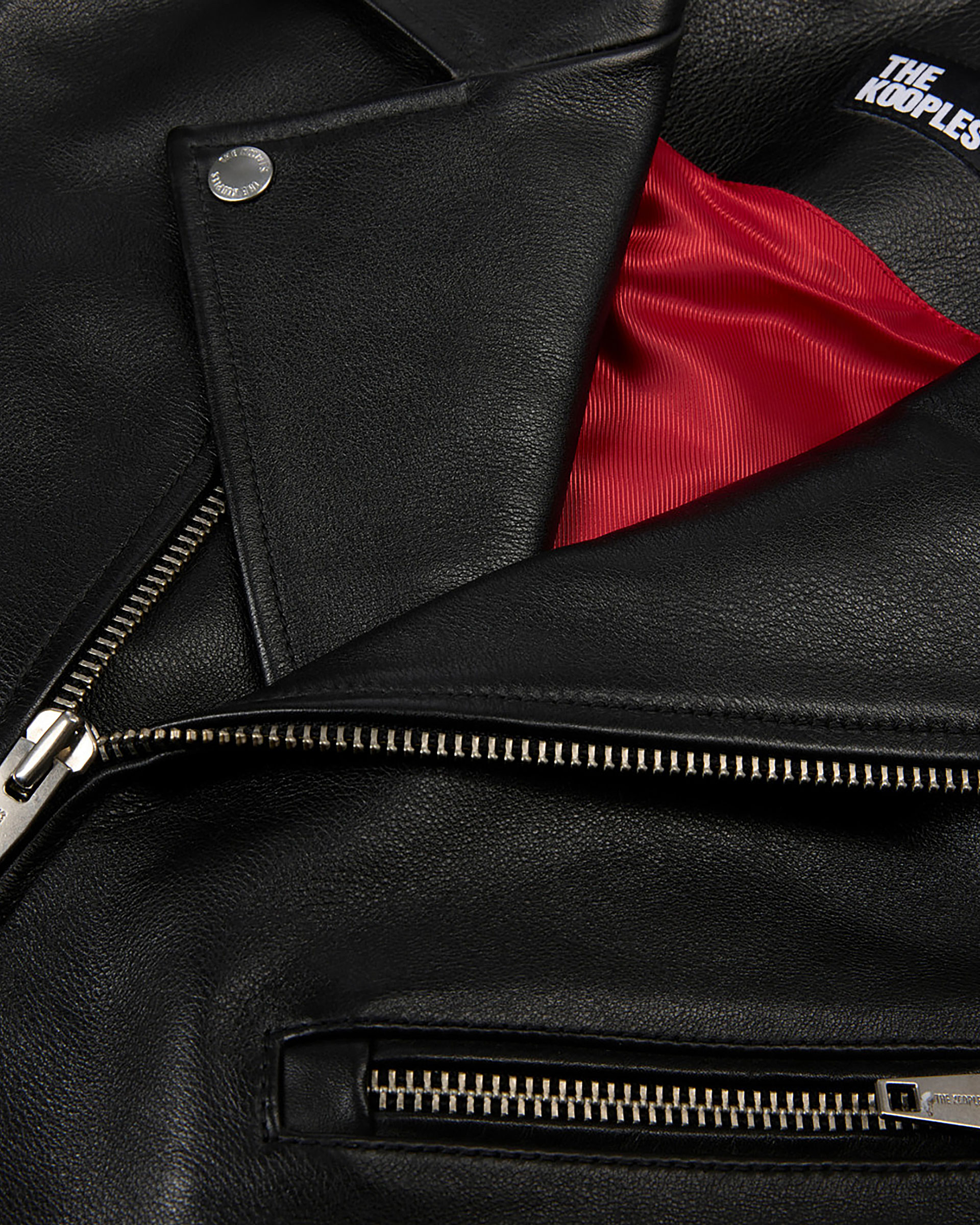 Black leather sleeveless jacket