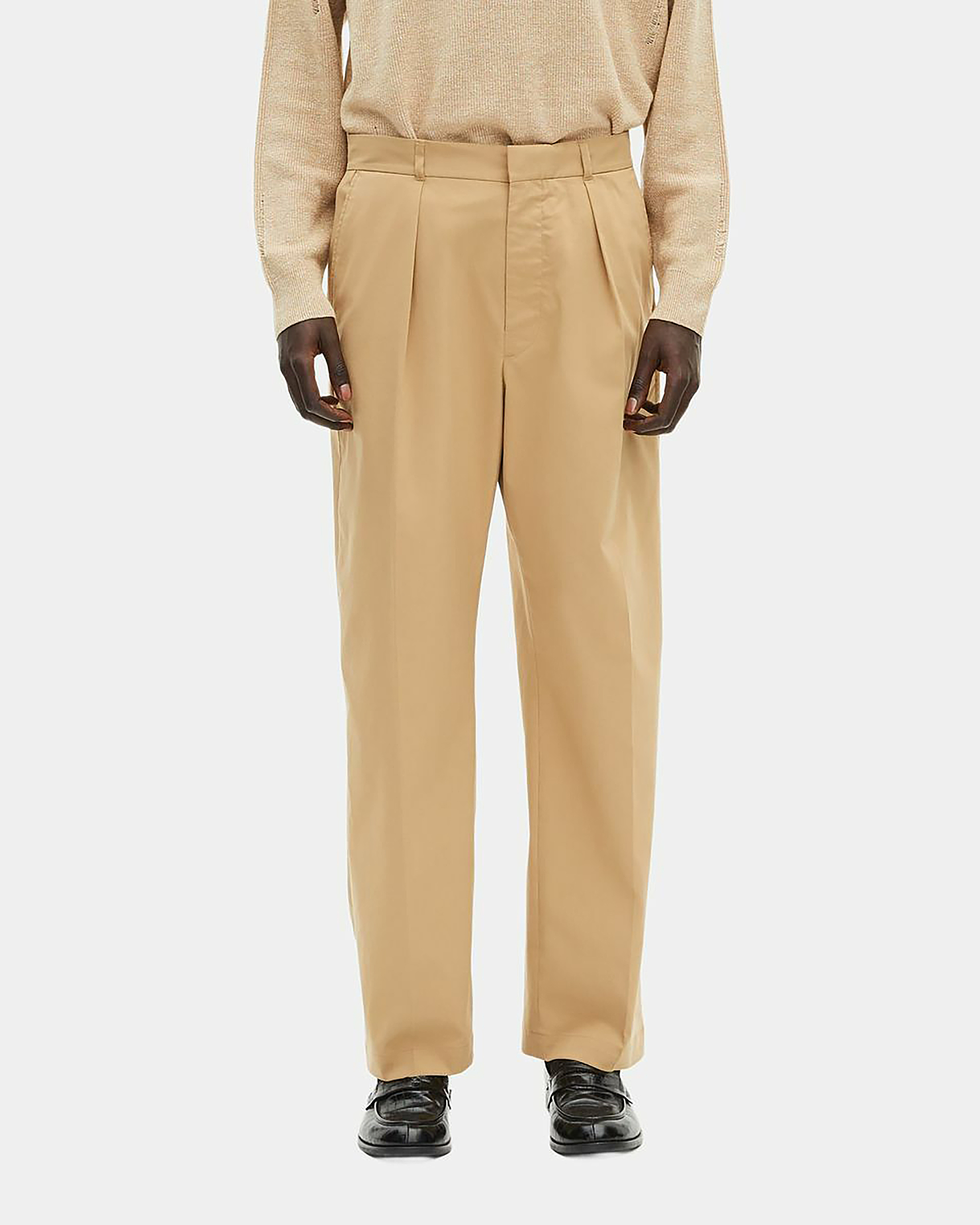 Beige pleated pants