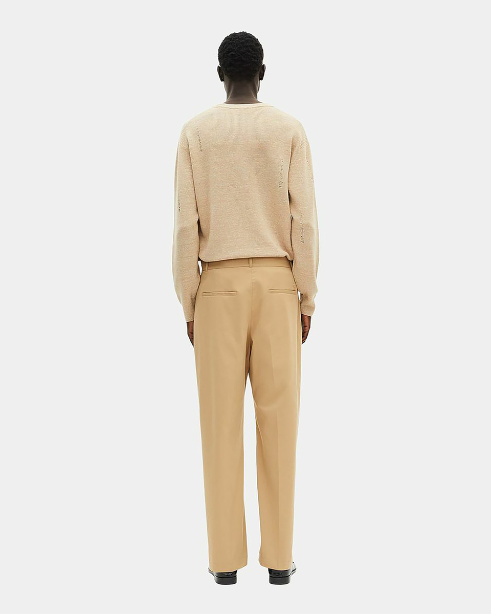 Beige pleated pants