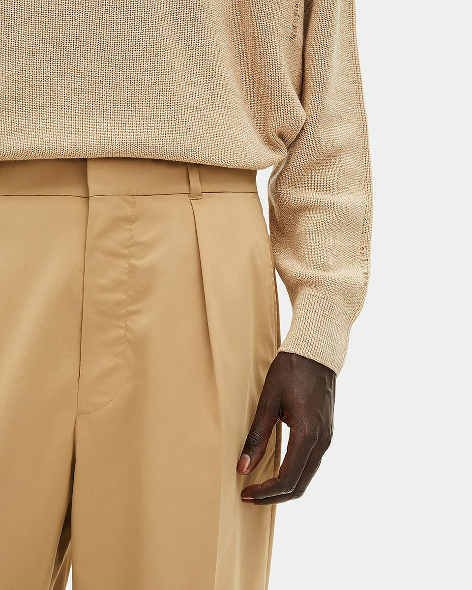 Beige pleated pants