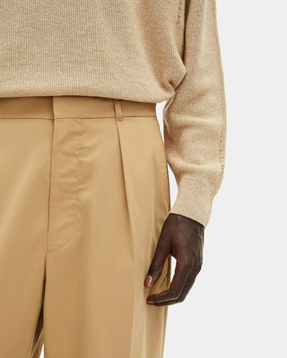 Beige pleated pants