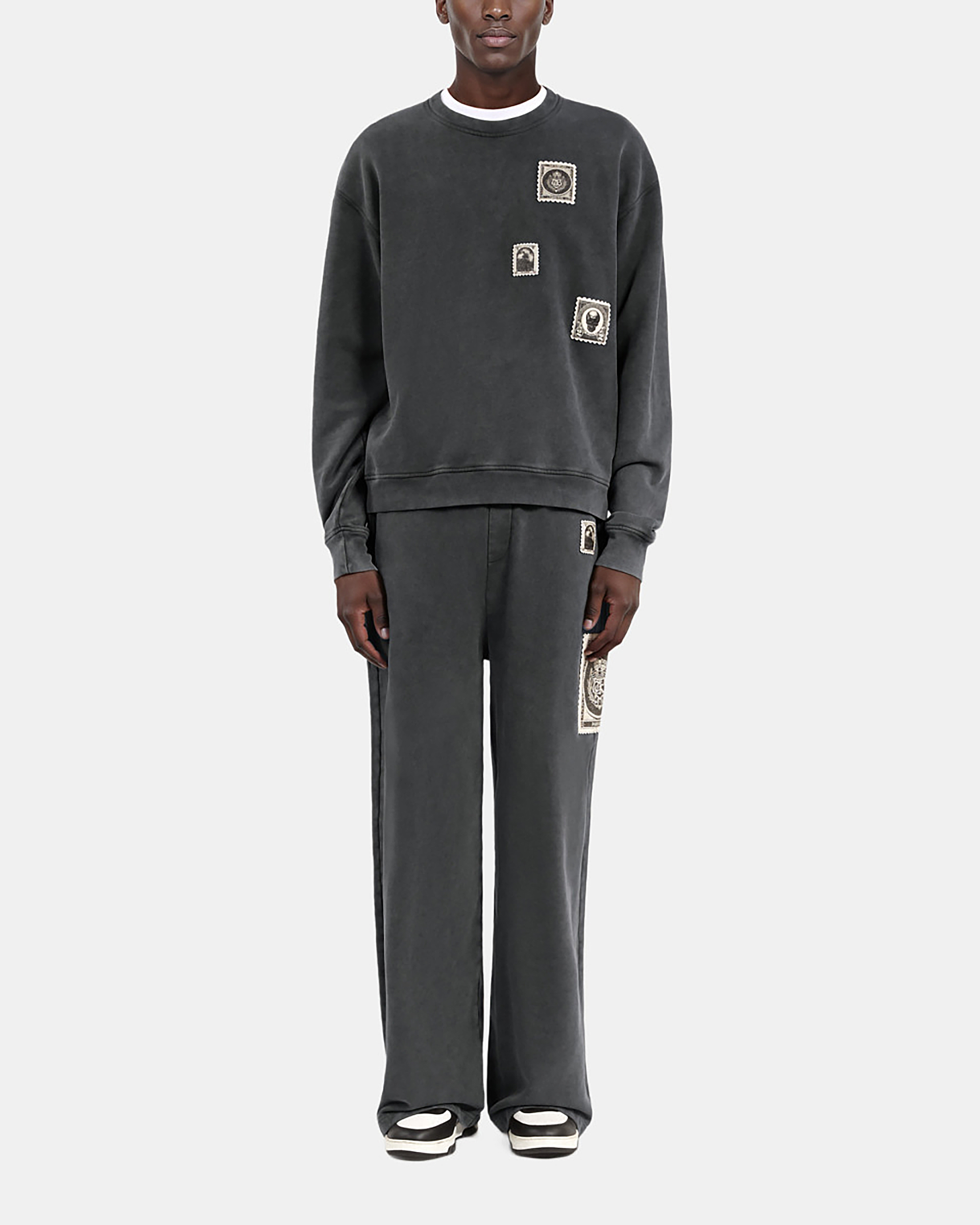 Black faded sweatshirt with patches