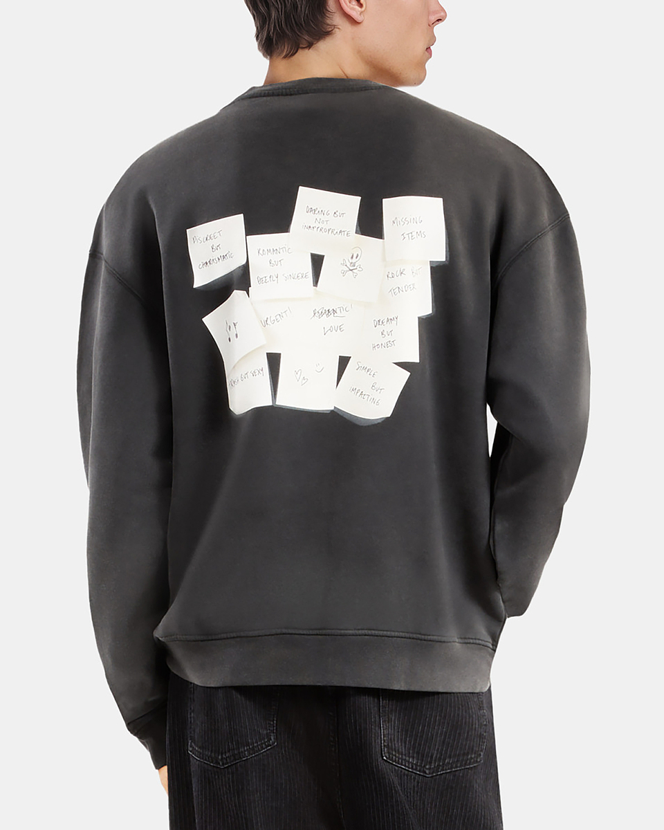 Sweatshirt with faded black screen print