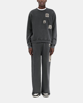 Black faded sweatshirt with patches