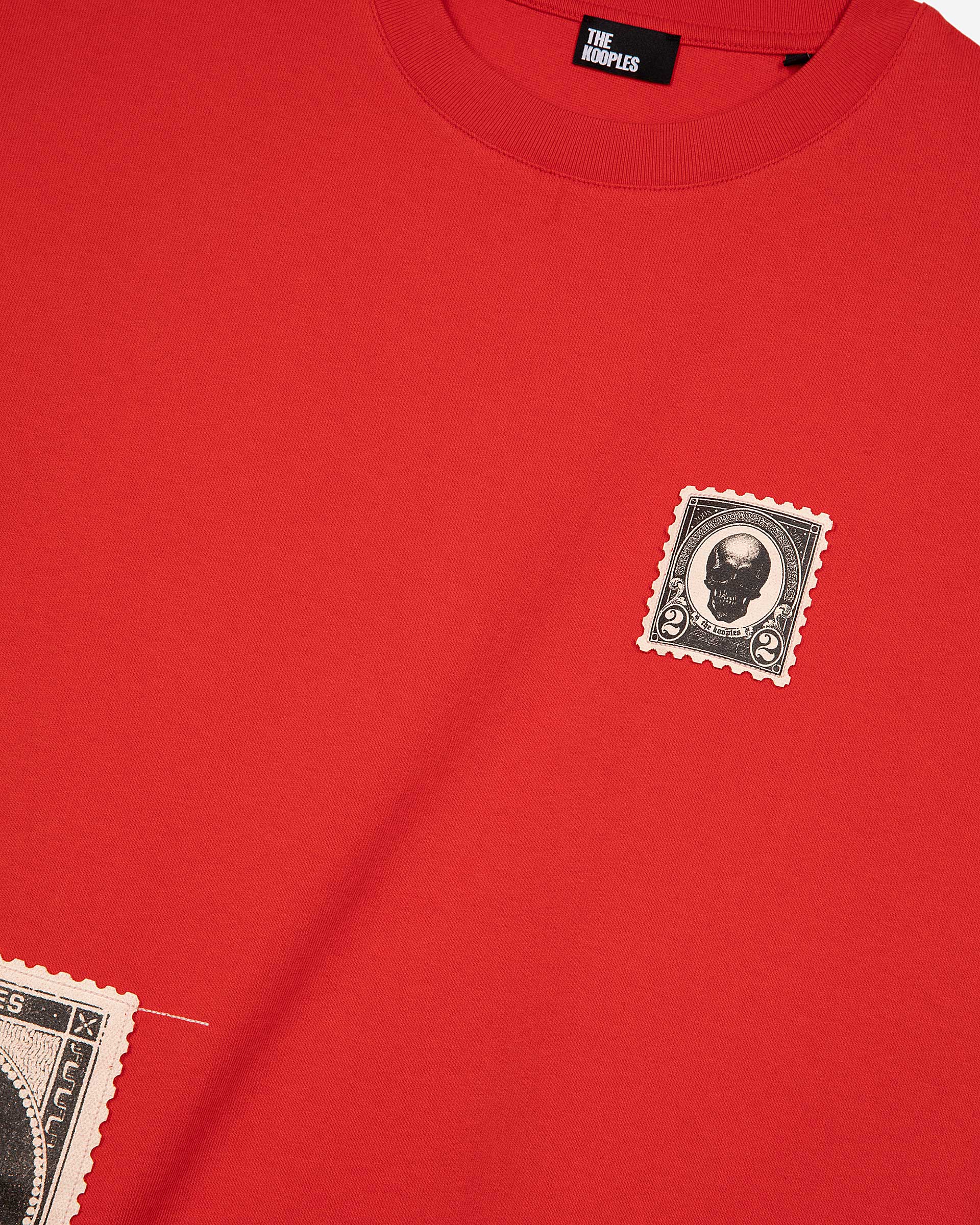 T-shirt with red patches