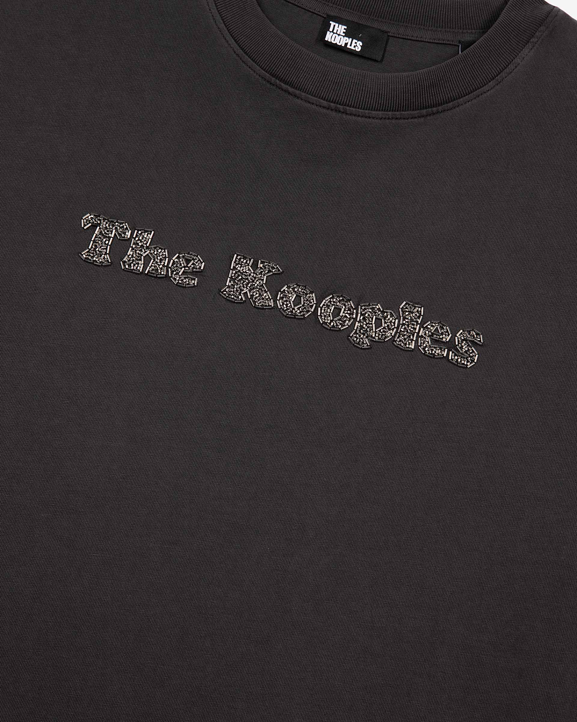 T-shirt with faded black logo