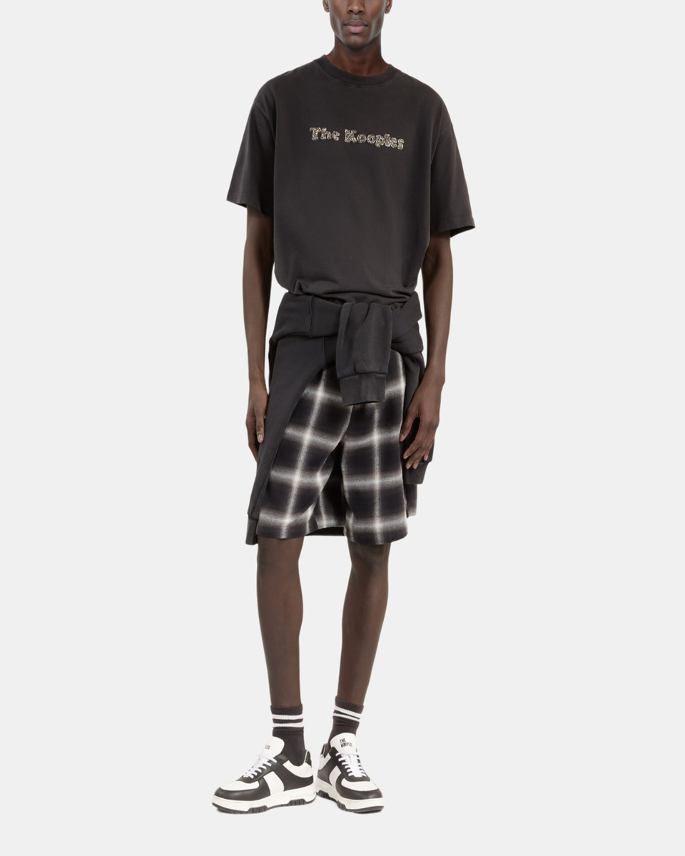 T-shirt with faded black logo